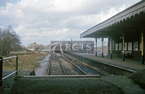 CAR1251C - View along the tracks from the buffer stops at Staines West station c April 1965