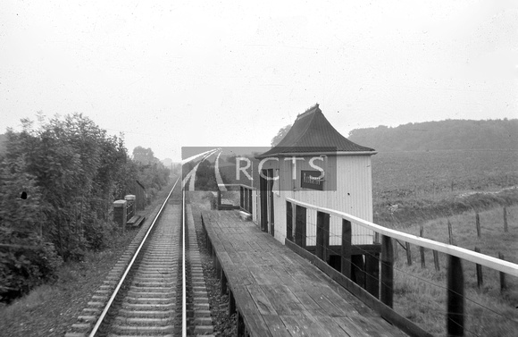 CC00487 - Rodmarton station (pogoda type shelter) viewed from a train c 1960s