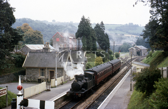 RIP0430C - Bampton station viewed from above and showing a train in the platform c 10/63