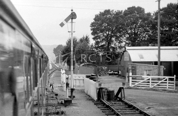 PG02268 - Coal yard and signal at Dunster station looking towards Minehead c late 1960s