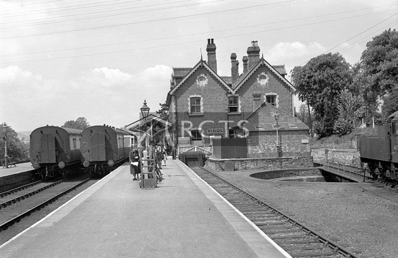 NB00713 - View along the platform at Brecon station showing two trains in the platforms 26/5/56