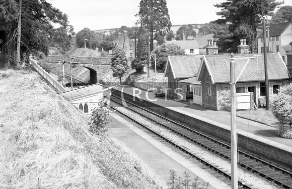 NB00717 - Bampton station viewed from the opposite embankment c early 1960s