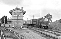 FAI0894 - Cl J15 CIE No. 125 at Attymon Junction on a rail tour (also shows signal box) 7/6/61