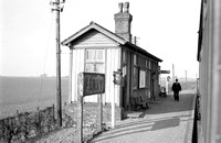 FAI0490 - View of station building at Ferry station on M&GN line from Sutton Bridge to Peterborough (from carriage window) 28/2/59