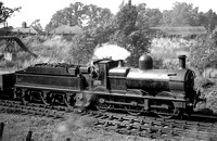 PHW0349 - Cl Dean goods No. 2529, ex works lined in BR black but no tender markings except lining, leaving Swindon on a goods train 5/9/49