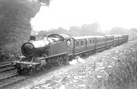 UNK0493 - Cl 3901 No. 3606 (with extended bunker and copper-capped chimney) on a passenger train believed to be on the North Warwick line c 1920s