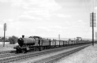 PHW0370 - Cl 2884 No. 3815 approaching Didcot with a long train of empties 27/7/50