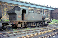 RE00153C - Ex GWR 2-6-2T (unidentified) derelict at an unidentified shed c 1964