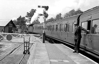 CH00020 - Unidentified loco on a Southampton to Cheltenham service leaving Nursling station (distant rear view) 28/6/58