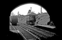BRO0053 - Wennington signal box, taken through the bridge, with an unidentified Cl 2MT stood alongside