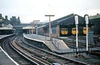 LAN0202C - View along the platform at Birkenhead Central station and showing the car sheds c March 1973