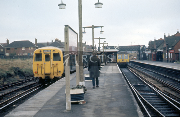 LAN0221C - View along the platform at Birkenhead North station with trains in the platforms c May 1973