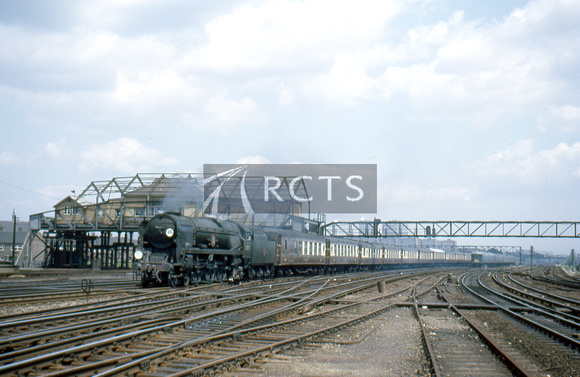 GMS0233C - Cl MN No. 35012 'United States Line' on a pullman train at Clapham Junction 14/6/65