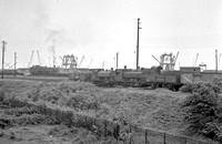 CUL0255 - Cl 0-4-0T Nos. 1144 and 1140 (ex SHT) at Swansea East Dock shed 14/5/57