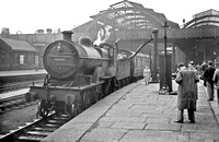 CAR0941 - Cl 2P No. 40909 (ex MR) taking water at Sheffield Midland c early 1950s