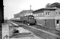 BALD214 - Cl WC No. 34102 on a passenger train passing Southampton Central signal box c 1960s