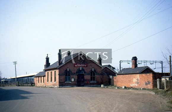 BEL0029C - Blisworth station buildings viewed from the approach road, April 1969