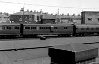 CUL2045 - LSWR lavatory BT No. S2993S at Portsmouth (side view over a wall and roof) 25/5/55