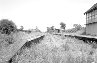 WOOL050 - Potter Heigham station looking north (after track removal and closure in March 1959) 15/7/63